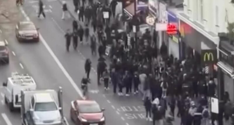 Families 'barricaded inside stores' as mobs of youths storm Clapham