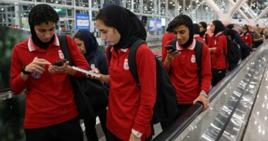 Federal Police are blasted for not keeping Iranian footballers in Australia amid signs players were the victims of human trafficking