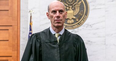 Federal judge temporarily changes grand jury rules after Trump effort to charge members of Congress