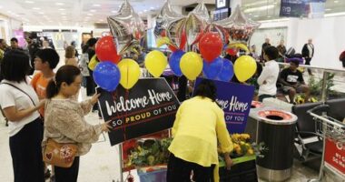First planeload of Australians stranded in Dubai lands in Sydney