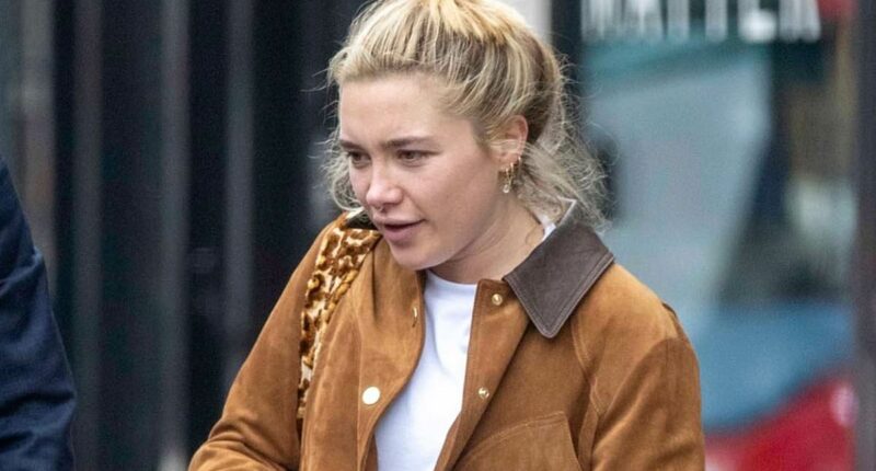 Florence Pugh leaves boutique gym in west London with beloved pet dog