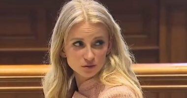 Glamorous cop on trial for trying to shoot colleague after break up