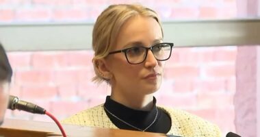 Glamorous cop takes the stand to fight for her freedom