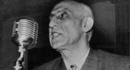 Persian Politicians; Dr. Muhammad Mossadeq -- Persia's Prime Minister and Minister of National Defence, photographed whilst delivering an impassioned radio address. June 10, 1953.