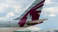 MANCHESTER, UNITED KINGDOM - AUG 07, 2015: Qatar Airways Airbus A330 tail livery at Manchester Airport Aug 07 2015.