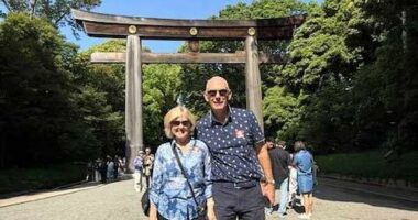 Lorraine and Howard Williams, pictured sightseeing in Japan during their cruise.