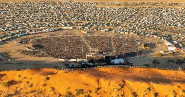The Big Red Bash, the self-proclaimed world's most remote music ﻿festival, is scrambling to find another venue after a rare deluge hit outback Queensland.