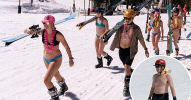In record heat, US ski resorts bulldoze snow -- skiers wear bikinis