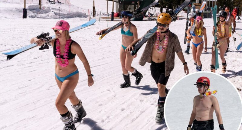 In record heat, US ski resorts bulldoze snow -- skiers wear bikinis