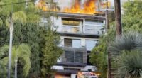 Inferno erupts at Hollywood Hills mansion as flames rip through roof