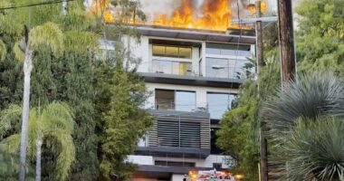 Inferno erupts at Hollywood Hills mansion as flames rip through roof
