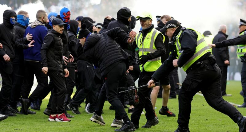Inside the 'shameful' Old Firm violence: Shocking new footage shows fan being KICKED in the head, a security guard is thrown to the floor and Celtic star clashes with fan as police release statement