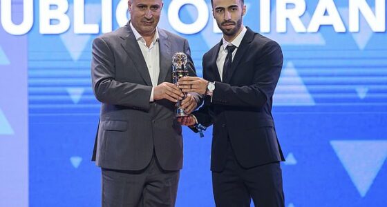 Mehdi Taj (left) has said Iran may not compete in this summer's 'inappropriate' World Cup