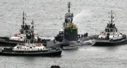 Iranian man, Romanian woman charged after allegedly trying to enter UK nuclear missile base, officials say