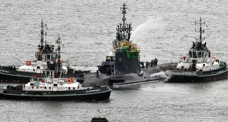 Iranian man, Romanian woman charged after allegedly trying to enter UK nuclear missile base, officials say