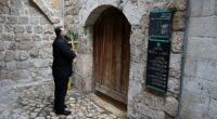 Israeli forces block head of the Catholic church in Jerusalem from the site of Jesus's crucifixion 
