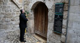 Israeli forces block head of the Catholic church in Jerusalem from the site of Jesus's crucifixion 