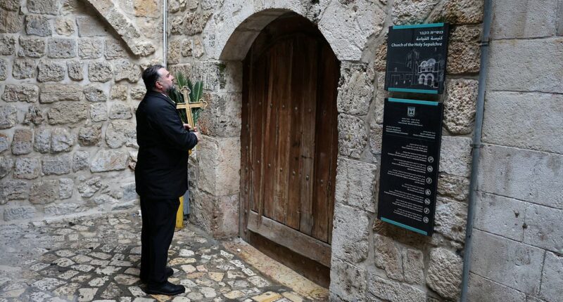 Israeli forces block head of the Catholic church in Jerusalem from the site of Jesus's crucifixion 