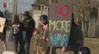 Jacksonville activists protest U.S. military strikes in Iran: 'Innocents are dying'
