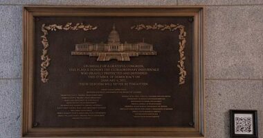 Jan. 6 plaque honoring police officers is installed at the Capitol after a 3-year delay