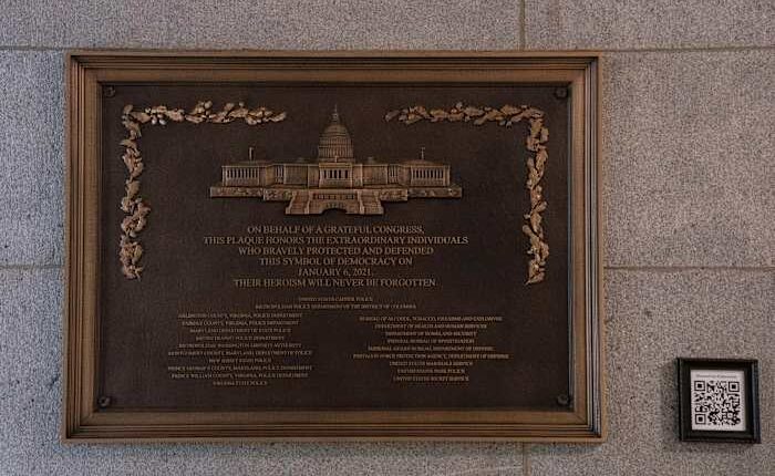 Jan. 6 plaque honoring police officers is installed at the Capitol after a 3-year delay