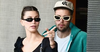 Justin Bieber can't keep his hands off wife Hailey in rare PDA moment