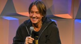 Keith Urban smiles amid Nicole Kidman and Simon Baker romance rumors