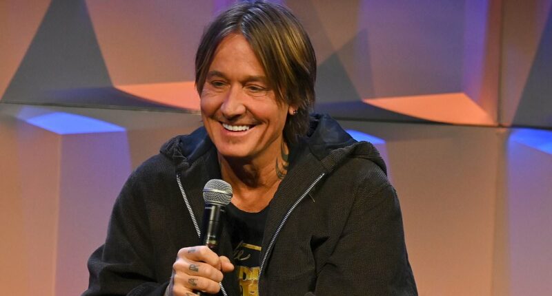 Keith Urban smiles amid Nicole Kidman and Simon Baker romance rumors
