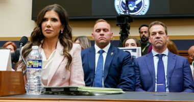 Kristi Noem is grilled about rumored lover as husband sits behind her