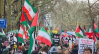 Leftist demonstrators chant 'victory to Iran' at march through London