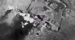 structures in Iran being struck by missiles