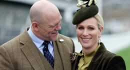 Mike Tindall's look of love! Former rugby ace gazes adoringly at his glamorous royal wife Zara as they step out for Day Three of Cheltenham