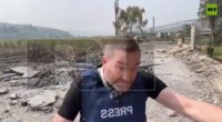 Missile lands metres from reporter crossing live on Russian TV from Lebanon
