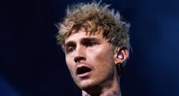 Mortifying moment fan faceplants after falling from stage at MGK show