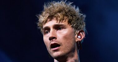 Mortifying moment fan faceplants after falling from stage at MGK show