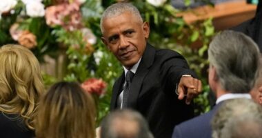 Obama's not-so-subtle gesture to 2028 hopeful sparks buzz at funeral