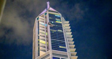 One man killed and two skyscrapers in flames hours after airport hit