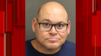 Orange County schools employee accused of molesting a child