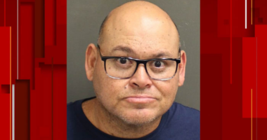 Orange County schools employee accused of molesting a child
