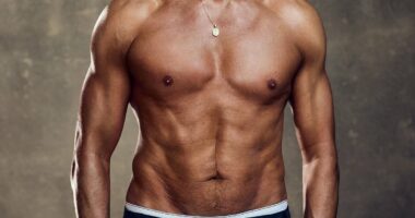 Paddy McGuinness, 52, shows off his  six-pack and bulging biceps