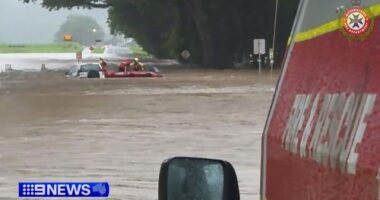 Heavy rainfall in Far North Queensland has sparked rescues for motorists stranded in floodwaters.Rescuers become life savers for the 65-year-old woman stuck on top of her car at Mossman, north-west of Cairns, about 6am today.