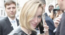 Phoebe Dynevor looks effortlessly chic in a black leather jacket
