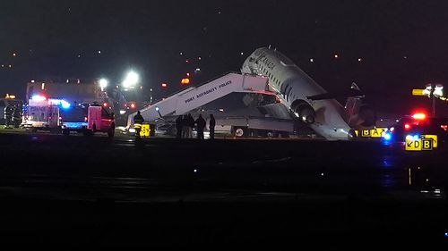 Pilots dead, major airport shut after plane collides with fire truck