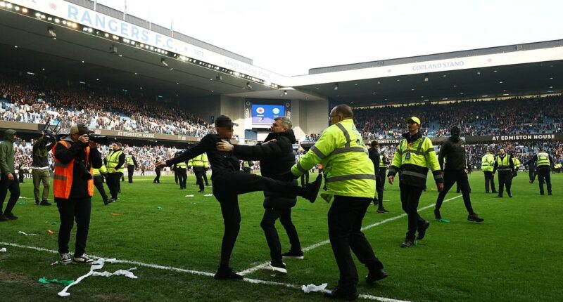 Police condemn 'shameful' scenes as they launch investigation into pitch invasion at Celtic's Scottish Cup win over Rangers