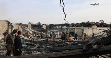 Rescue crews dig bodies out of the ruins of a Kabul hospital hit in an airstrike blamed on Pakistan