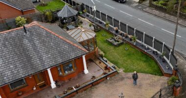 Retired couple forced to tear down £4,500 seven-foot tall fence