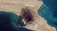 In this satellite photo from Planet Labs PBC, smoke rises over Konarak Naval Basin, Iran, March 1, 2026.