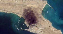 In this satellite photo from Planet Labs PBC, smoke rises over Konarak Naval Basin, Iran, March 1, 2026.