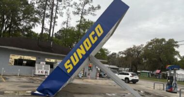 Severe storms topple gas station awning amid heavy rain and wind