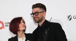 Sharon Osbourne smiles with her son Jack at charity event